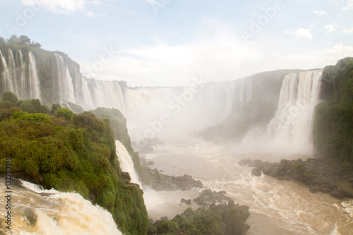 Iguazu  Iguacu  falls  largest series of waterfalls on the planet  located between Brazil  Argentina  and Paraguay with up to 275 separate waterfalls cascading along 2 700 meters  1.6 miles  cliffs.