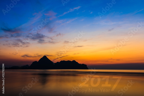 Happy New Year 2017. Natural scene beach and sea at sunrise time