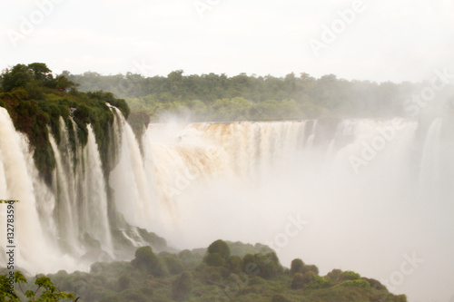 Iguazu  Iguacu  falls  largest series of waterfalls on the planet  located between Brazil  Argentina  and Paraguay with up to 275 separate waterfalls cascading along 2 700 meters  1.6 miles  cliffs.
