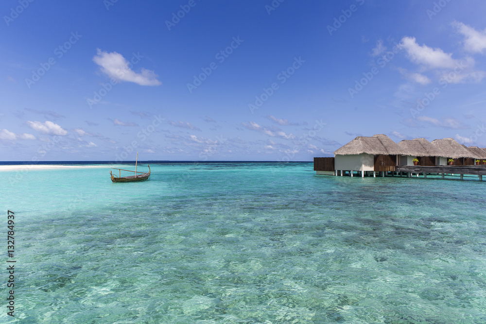 Water villas on the tropical island at maldives