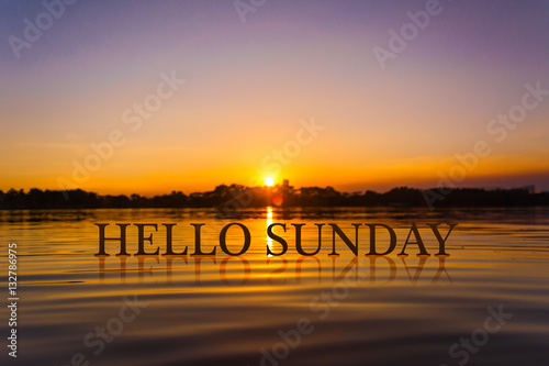 'HELLO SUNDAY  ' with sunset water , twilight time photo