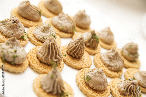 crackers with pate and parsley