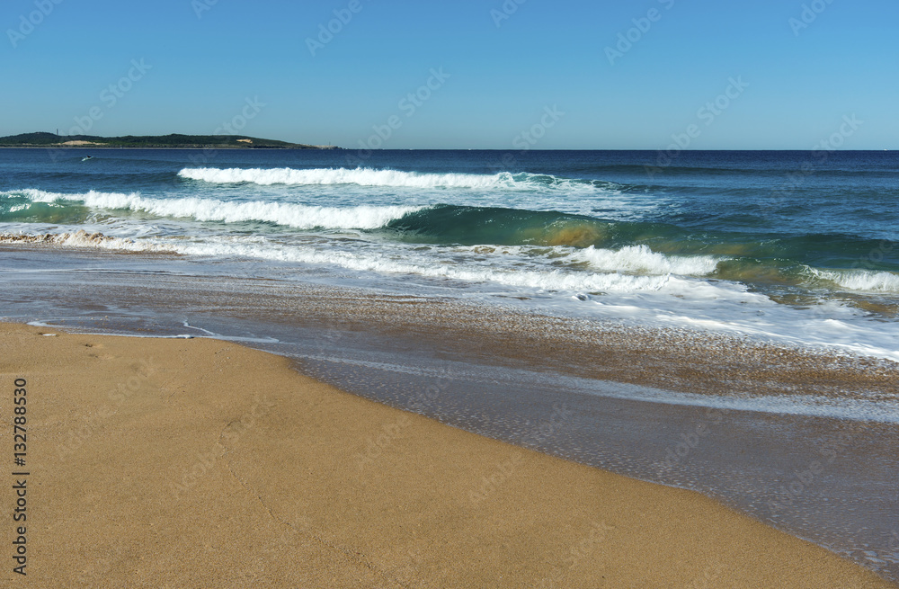 Cronulla Beach Sydney surfers foam waves.