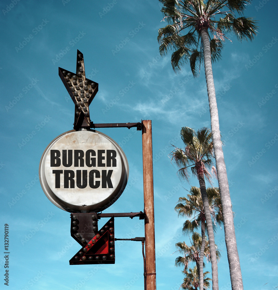 Φωτογραφία aged and worn vintage photo of burger truck sign with palm trees