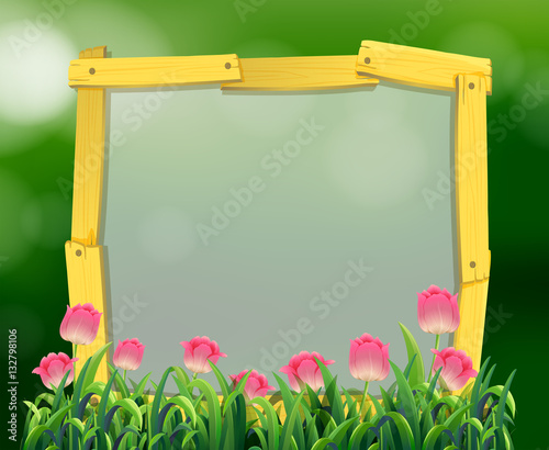 Wooden frame with pink tulip flowers