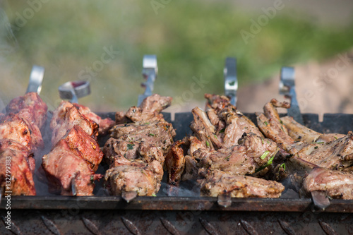 barbecue grill, skewers with meat  open air photo