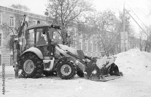 snow machine with a bucket outdoor street city