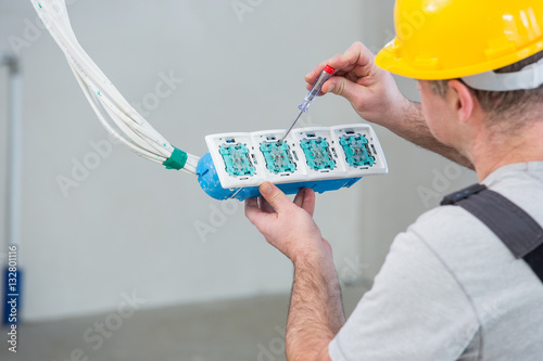 Obraz na płótnie Electrician working , close-up of Electrician work
w salonie