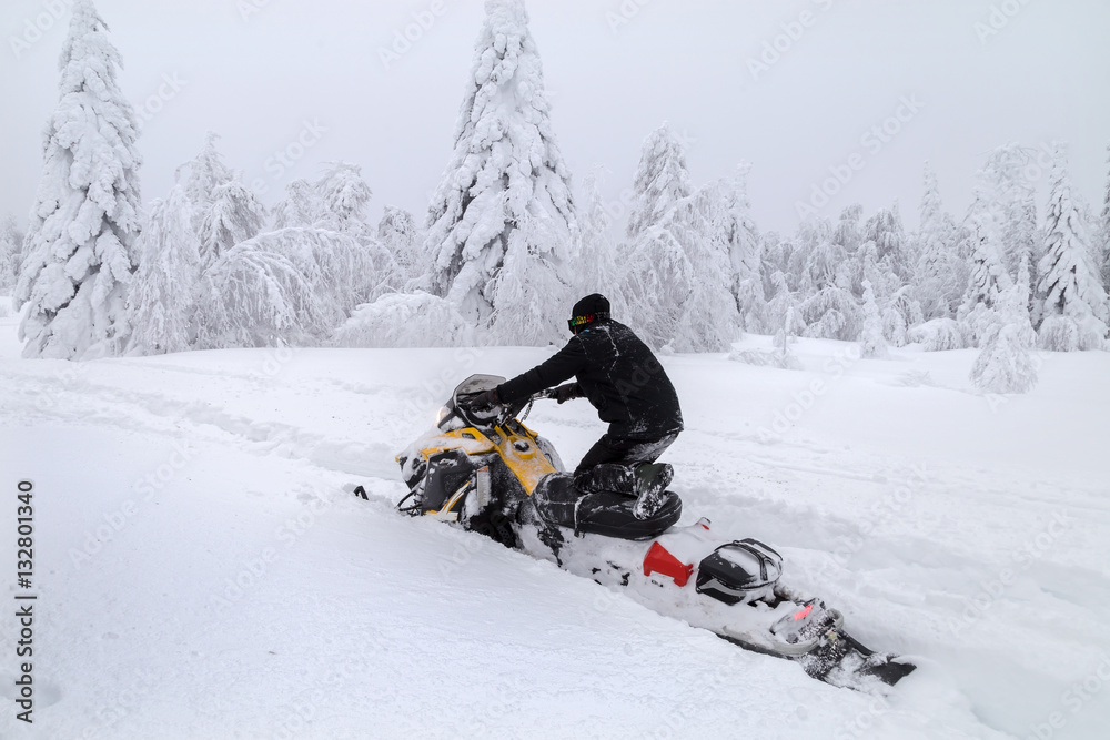 Athlete on a snowmobile