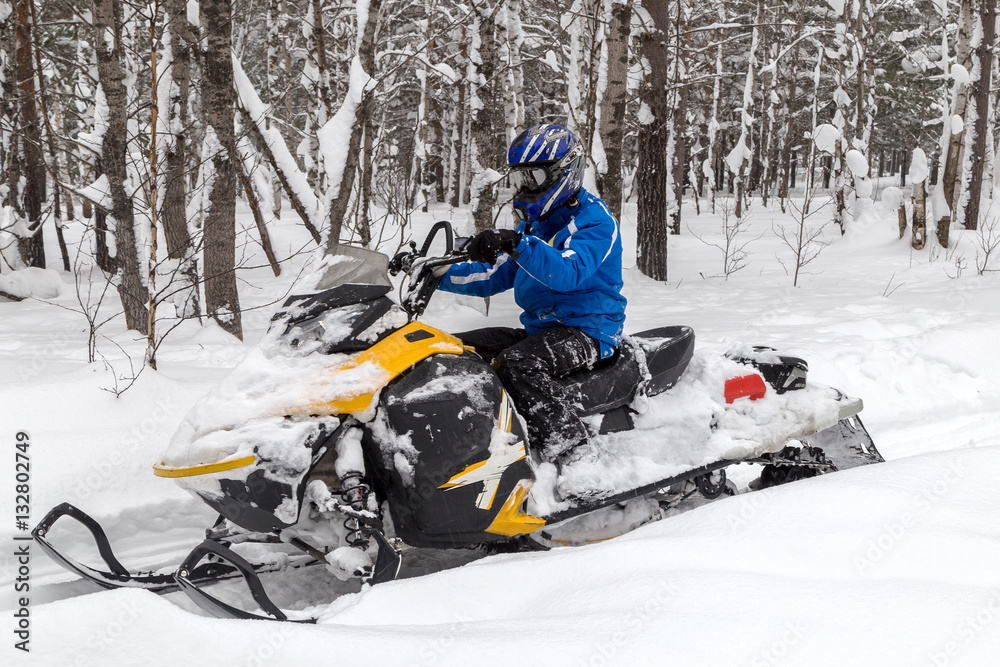 Athlete on a snowmobile