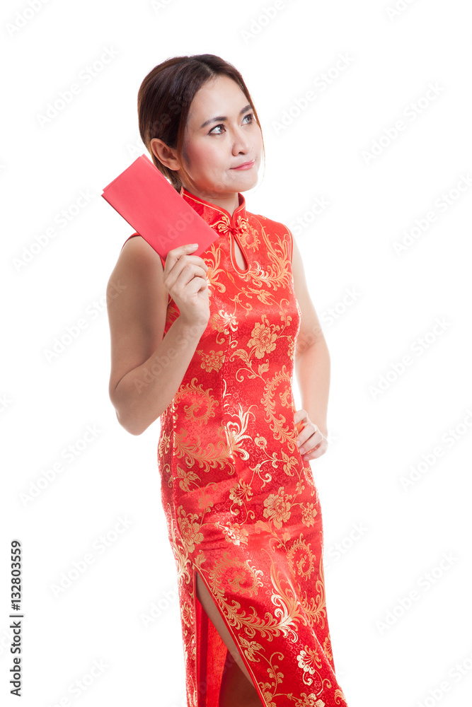 Asian girl in chinese cheongsam dress with red envelope. Asian girl in chinese cheongsam dress with red envelope.