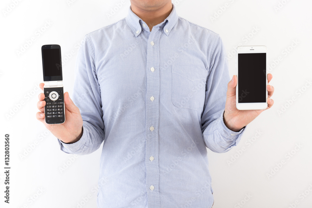 Φωτογραφία 男性　スマートフォン　ガラケー