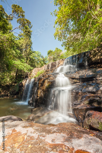 Fototapeta Naklejka Na Ścianę i Meble -  Natural background of waterfall cascade in National Park of Thai