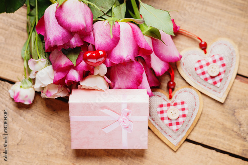 Fototapeta Naklejka Na Ścianę i Meble -  Roses, heart shape and gift boxes 