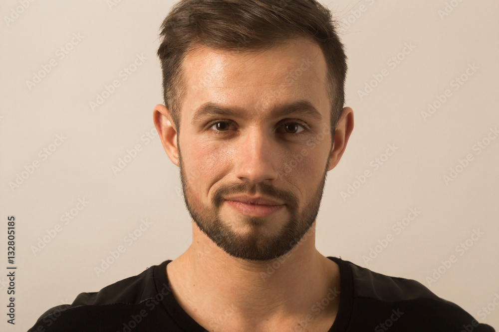 Fototapeta premium portrait of a successful young man on a light background . the p