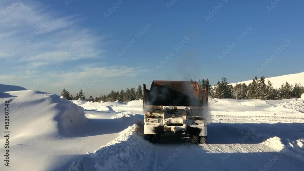 Working KAMAZ in the winter in the industrial zone Working KAMAZ in the winter in the industrial zone
