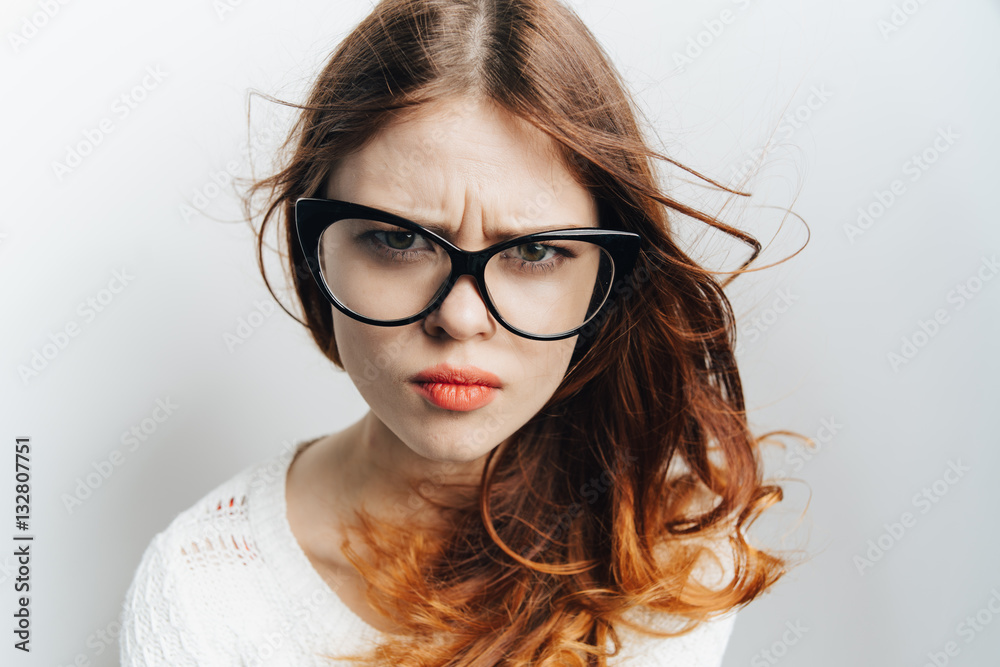 Obraz premium girl with glasses on a white background