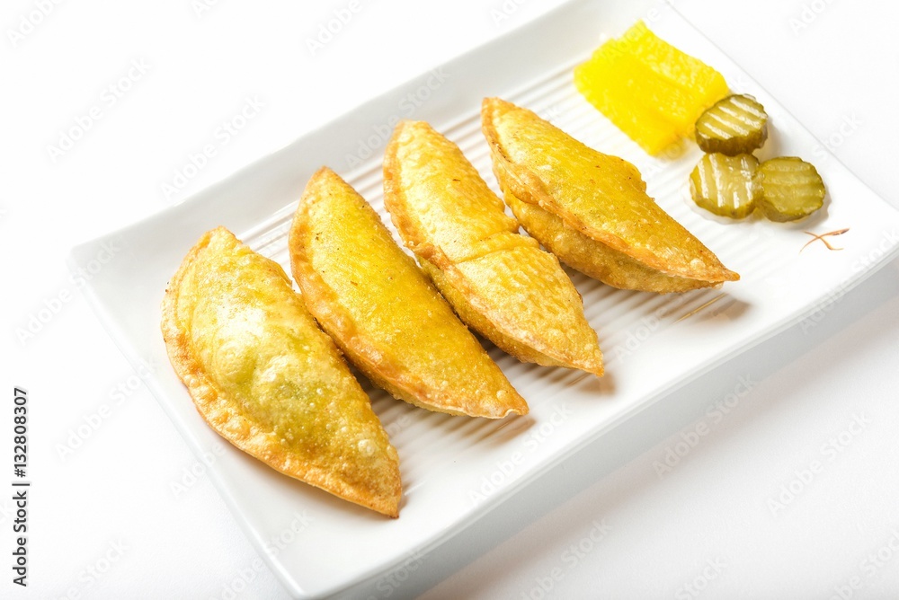 mandu twigim Fried Dumplings on plate mandu twigim Fried Dumplings on plate