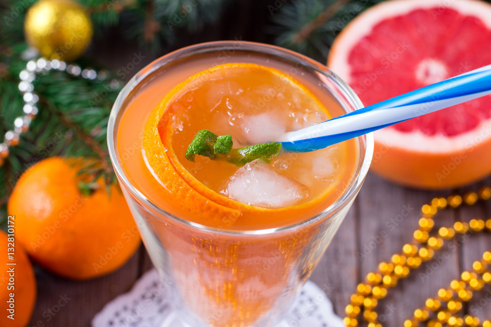 Cup of fresh orange juice for winter and Christmas Cup of fresh orange juice for winter and Christmas