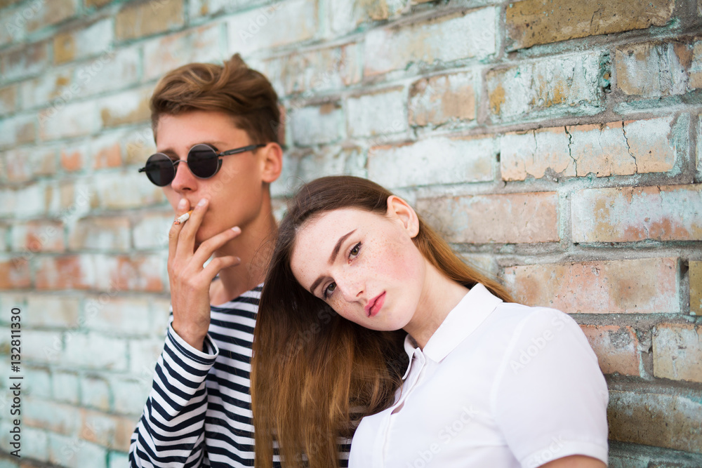 Close up portrait of attractive young couple  outdoors