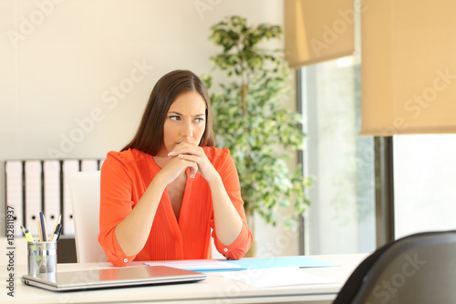 Thoughtful woman waiting for a job interview