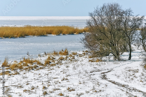 Wallpaper Mural Picturesque landscape with snow-covered banks of the river Torontodigital.ca