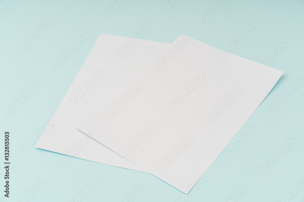 Blank flyer poster, brochure mockup,A4, US-Letter, on blue backg Blank flyer poster, brochure mockup,A4, US-Letter, on blue backg