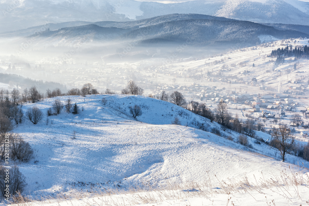 Winter at the Carpathian mountains, snowy alpine countryside landscape Winter at the Carpathian mountains, snowy alpine countryside landscape