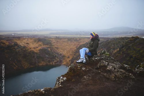 Woman with Closed Eyes on Top of Hill