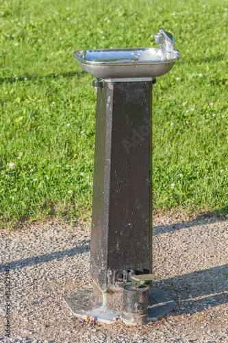 Public drinking water tap in the public park.