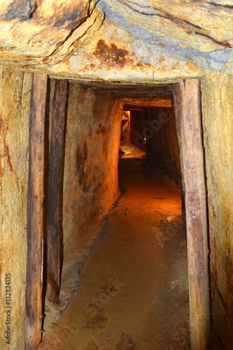  Gold - old roman tunnel in gold mine Rosia Montana, Transylvania. The rich mineral resources of the area have been exploited since Roman times or before. photo