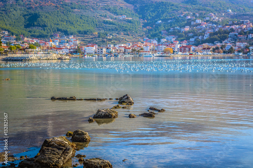 Podstrana coastal town view. / Scenic view at small mediterranean town Podstrana in suburb of town Split, croatian summer touristic destination. photo