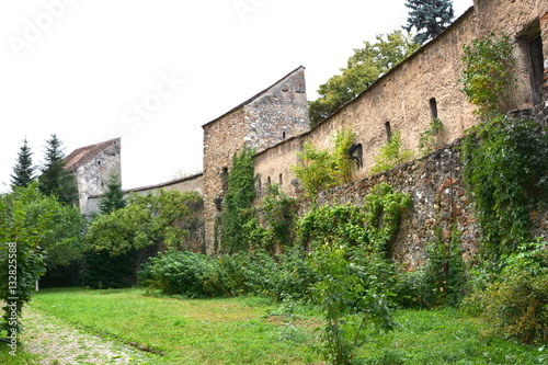 Fortified medieval church Ghimbav, Transylvania. The town was first mentioned in a letter written in 1420 by King Sigismund of Luxembourg.  photo