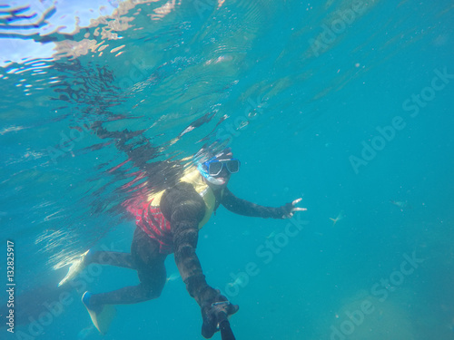 Underwater scuba diving selfie in Great Barrier Reef, Australia © gustavofrazao