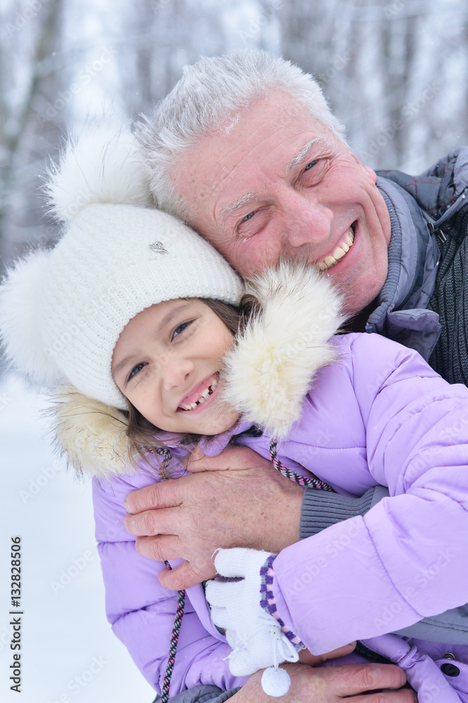happy grandfather and granddaughter happy grandfather and granddaughter