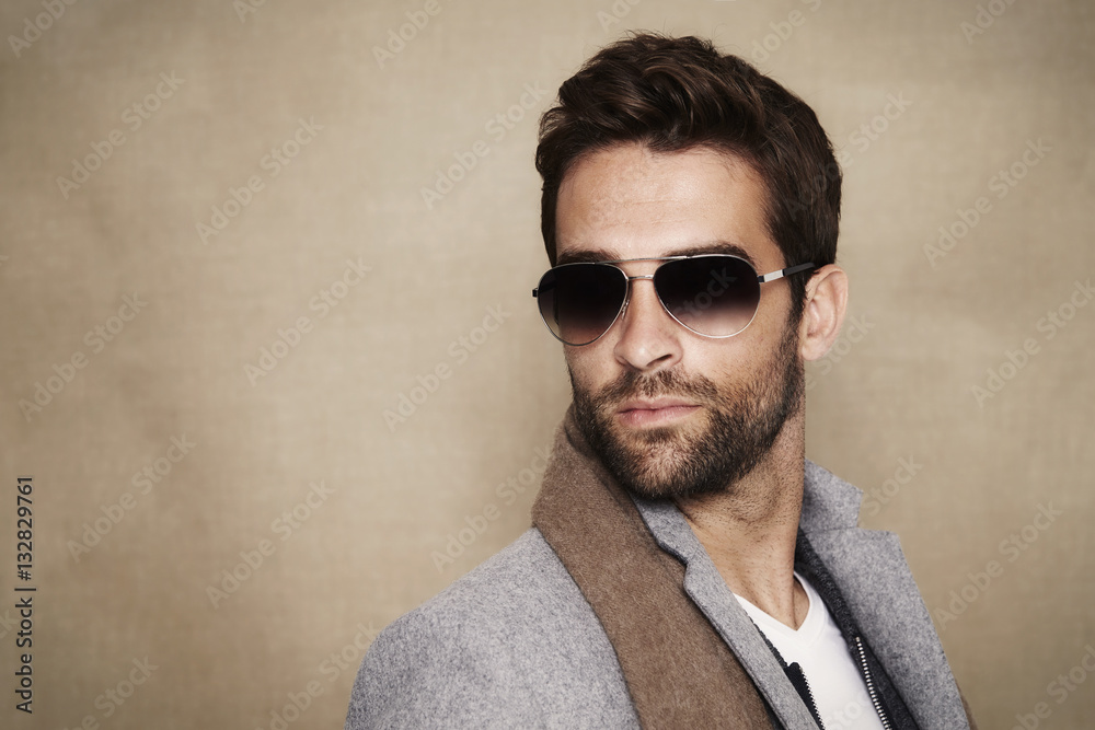 Dude in scarf and shades, looking away Dude in scarf and shades, looking away