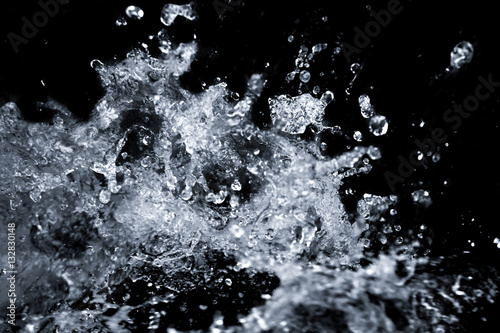 Water splash on black background