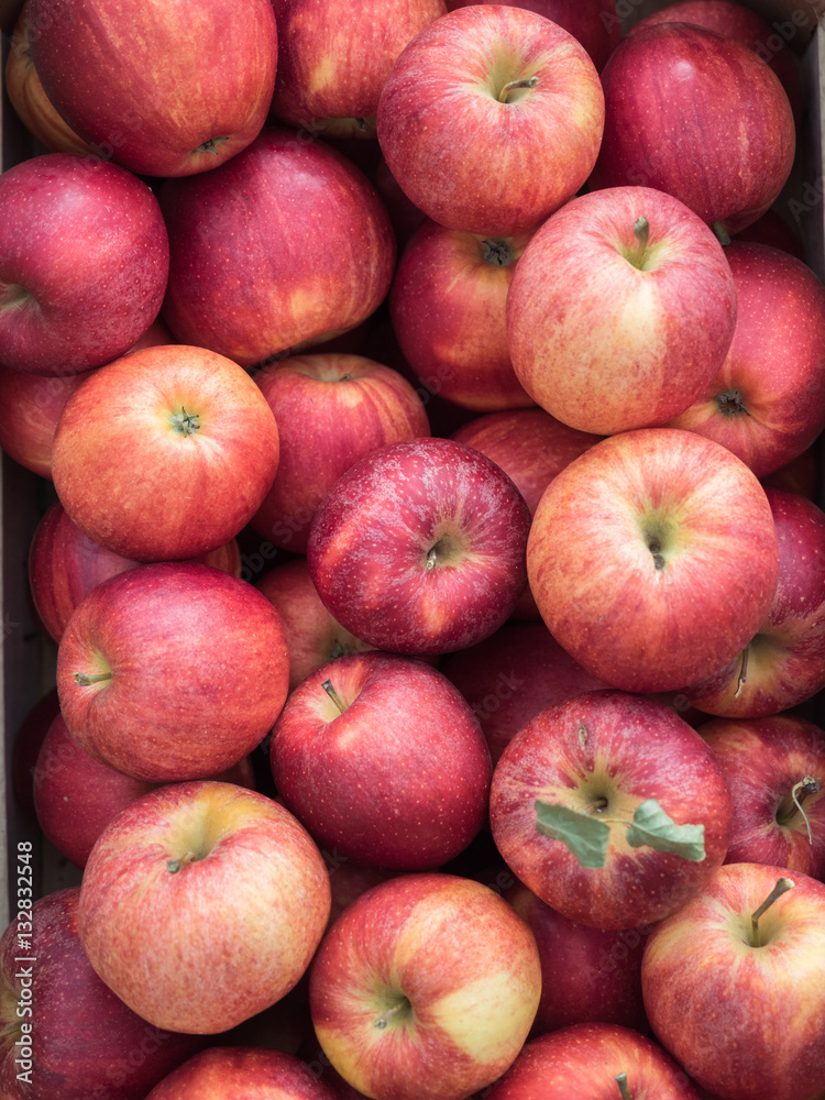 Background of red apples close up. Red apples pattern on sale at the market. Background of red apples close up. Red apples pattern on sale at the market.