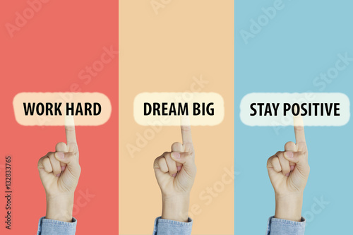 Hands fingers pointing with index fingers to Work Hard,Dream Big