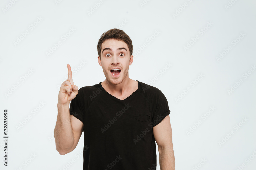 Cheerful man looking at camera and have an idea. Cheerful man looking at camera and have an idea.