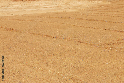 Yellow lined sand for asphalting on construction site at sunny d photo