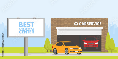 Automobile repair shop garage. The car on background of brick building. Urban space in the background. Billboard and signboard