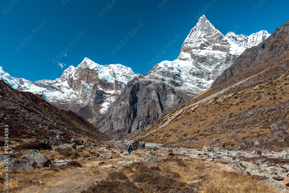 Flat Bottom of Valley and sharp high Peaks of Himalaya