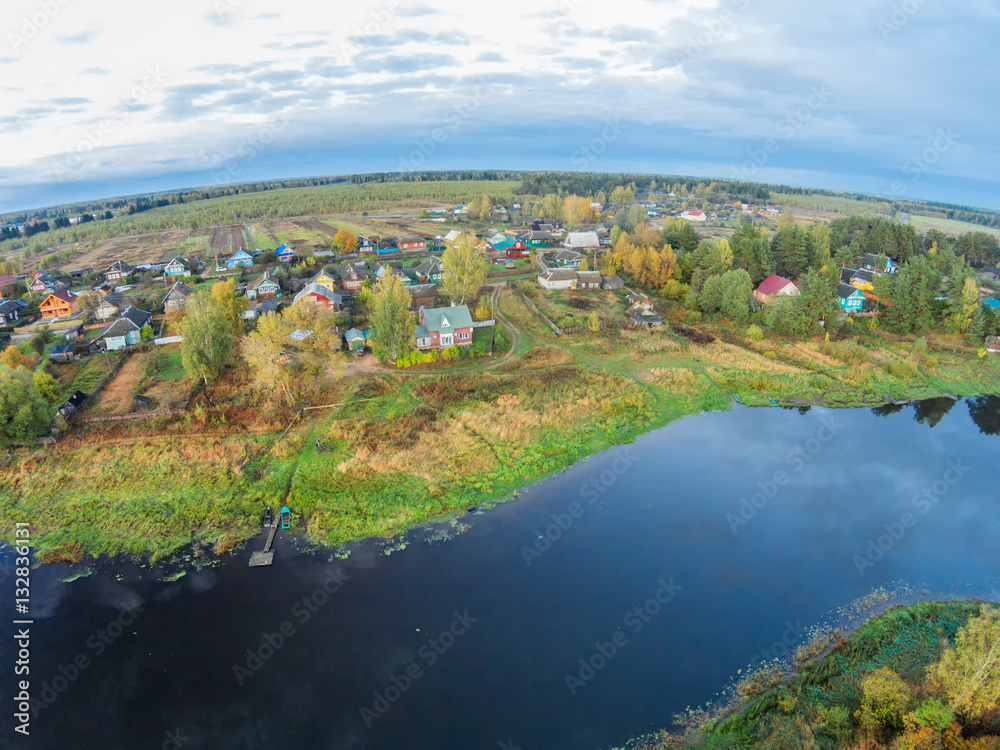 The village on the banks of the river Mologa.