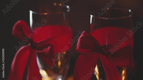 Slowmotion. Romantic Interior: dim lights, candles. A date for Valentine's Day. Erotic atmosphere for a romantic pastime loving couple: twilight, candlelight. The 14th of February.
