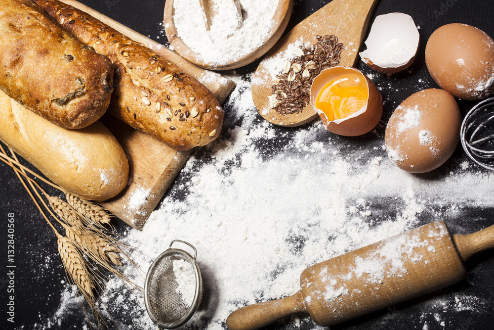 Fototapeta premium Ingredients and utensils for the preparation of bakery products