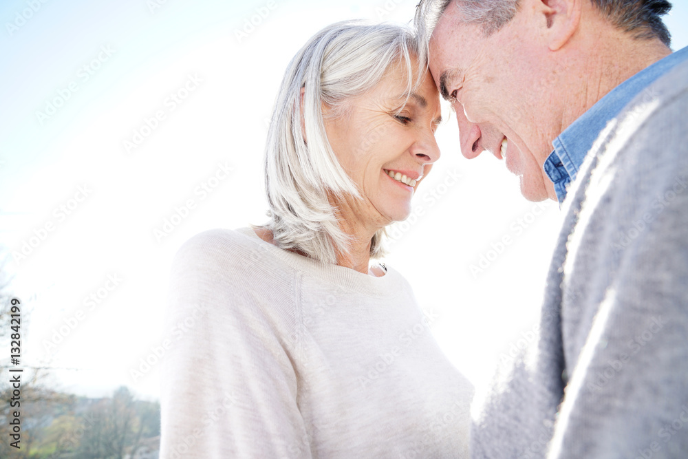 Portrait of senior couple embracing each other Portrait of senior couple embracing each other
