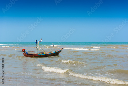 Boat on the beach at afternoon © nipastock