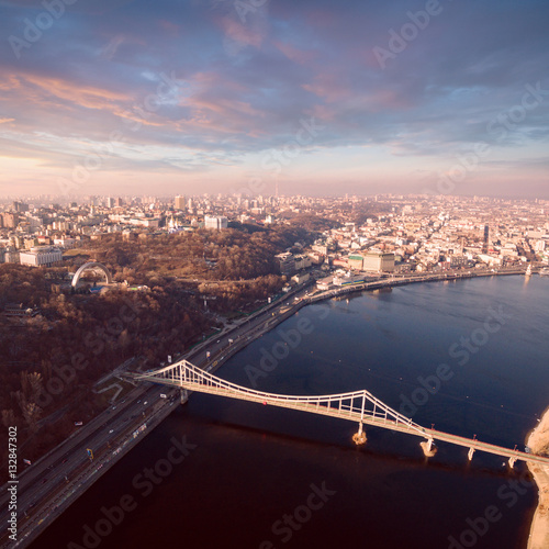 Aerial view of Kiev, Ukraine in winter. Khreshchatyi park and the Arch of Friendship of Peoples from the left side and the river Dnepr with the right hand. photo