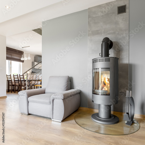 Grey villa interior with fireplace